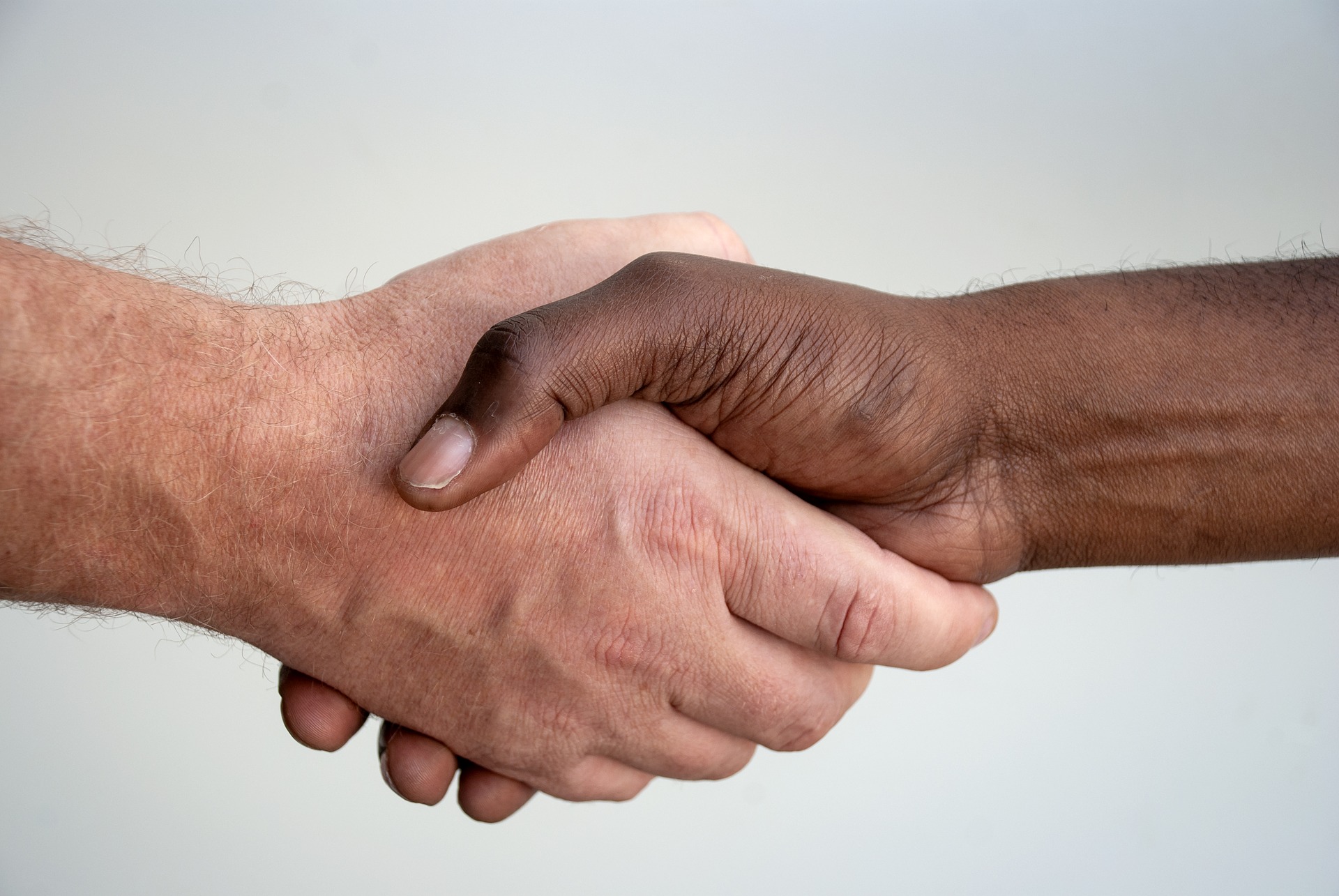 Photo of two people shaking hands
